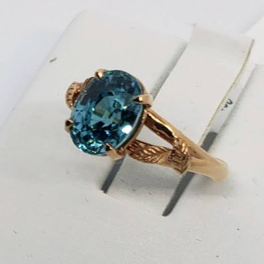 28k Blue Zircon Oval in Rose Gold